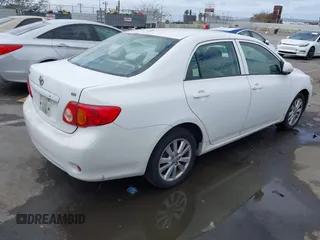 2009 Toyota Corolla with VIN 1NXBU40E99Z082845, listed as a IAAI auction lot 42046564 with 180,910 mi miles. Bid and sale history available at carsss.com. Image 4.