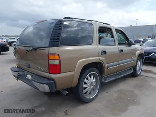 2003 Chevrolet Tahoe LS with VIN 1GNEC13V33J338251, listed as a IAAI auction lot 41634451 with 265,779 mi miles. Bid and sale history available at carsss.com. Image 4.
