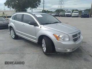 2011 Dodge Caliber Heat with VIN 1B3CB5HA7BD160827, listed as a IAAI auction lot 41374295 with 127,403 mi miles and . Bid and sale history available at carsss.com. Image 1.