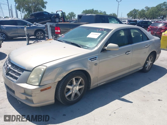 2008 Cadillac STS RWD with VIN 1G6DW67V780153199, listed as a IAAI auction lot 42058808 with 164,961 mi miles and . Bid and sale history available at DreamBid. Image 2.