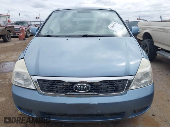 2011 Kia Sedona LX with VIN KNDMG4C70B6424016, listed as a IAAI auction lot 41964190 with 116,859 mi miles. Bid and sale history available at carsss.com. Image 12.