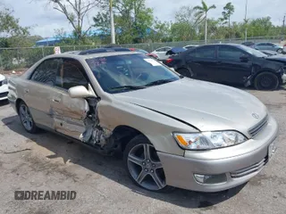 2001 Lexus ES 300 with VIN JT8BF28G415106734, listed as a IAAI auction lot 41730960 with 113,378 mi miles. Bid and sale history available at carsss.com. Image 1.