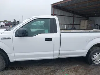 2016 Ford F-150 XL with VIN 1FTMF1C89GKF71802, listed as a IAAI auction lot 41557014 with 129,794 mi miles. Bid and sale history available at carsss.com. Image 14.