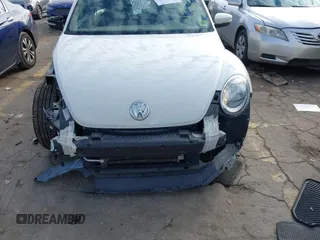 2014 Volkswagen Beetle 2.5L w/Sun with VIN 3VWJP7ATXEM628666, listed as a IAAI auction lot 41328014 with 70,990 mi miles and . Bid and sale history available at DreamBid. Image 6.