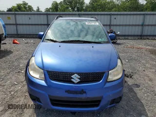 2012 Suzuki SX4 Crossover z VIN JS2YB5A39C6307239, wystawiony jako Copart lot #59947195 z przebiegiem 87 781 mil mil oraz Czysty tytuł • Clean title. Historia ofert i sprzedaży dostępna na DreamBid. Obrazek 5.