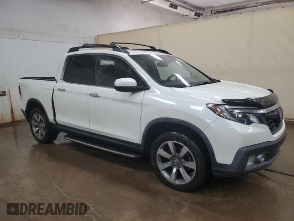 2018 Honda Ridgeline RTL-E with VIN 5FPYK3F74JB001049, listed as a Copart auction lot 57590075 with 111,848 mi miles and Clean title. Bid and sale history available at DreamBid. Image 4.