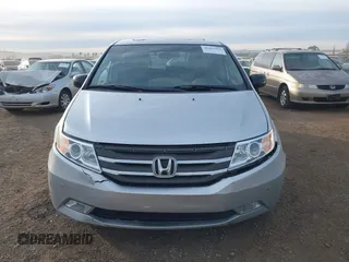2012 Honda Odyssey Touring with VIN 5FNRL5H96CB095264, listed as a IAAI auction lot 41403450 with 246,199 mi miles and . Bid and sale history available at carsss.com. Image 12.