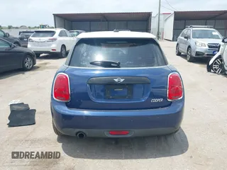 2017 MINI Hardtop 4 Door Cooper with VIN WMWXU1C59H2E18069, listed as a IAAI auction lot 42286035 with 85,835 mi miles and . Bid and sale history available at DreamBid. Image 16.