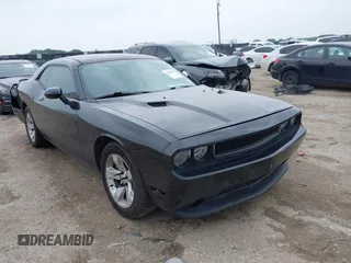 2013 Dodge Challenger SXT z VIN 2C3CDYAG0DH719203, wystawiony jako IAAI lot #42299509 z przebiegiem 121 947 mil mil oraz . Historia ofert i sprzedaży dostępna na DreamBid. Obrazek 1.