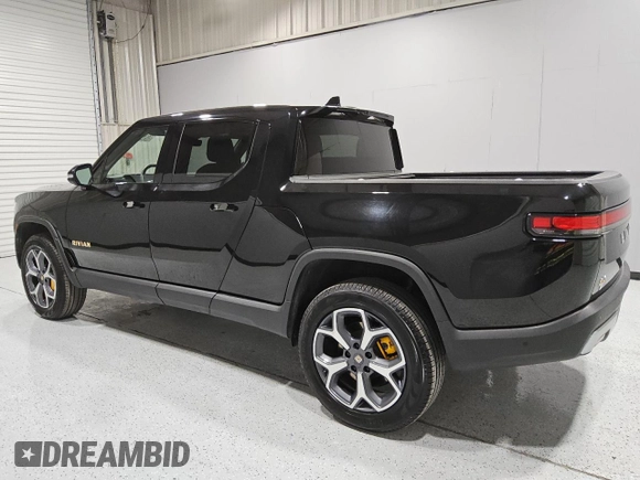 2022 Rivian R1T Adventure z VIN 7FCTGAAA5NN007486, wystawiony jako Copart lot #52649075 z przebiegiem 23 292 mil mil oraz Czysty tytuł • Clean title. Historia ofert i sprzedaży dostępna na DreamBid. Obrazek 2.