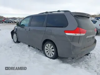 2011 Toyota Sienna XLE AAS with VIN 5TDYK3DC5BS138281, listed as a IAAI auction lot 41381494 with 194,635 mi miles and . Bid and sale history available at DreamBid. Image 3.