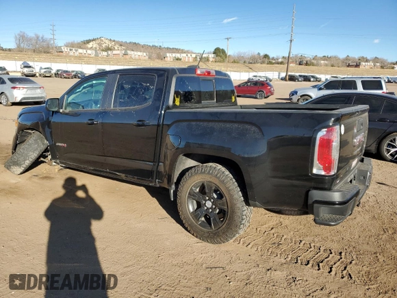 2021 GMC Canyon 4WD AT4 w/Cloth with VIN 1GTG6FEN9M1254293, listed as a Copart auction lot 87163874 with 33,645 mi miles and Salvage Title. Bid and sale history available at carsss.com. Image 2.