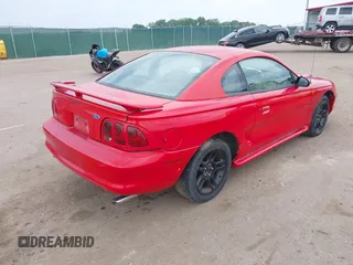 1996 Ford Mustang z VIN 1FALP4045TF183390, wystawiony jako IAAI lot #42361063 z przebiegiem 163 194 mil mil oraz . Historia ofert i sprzedaży dostępna na DreamBid. Obrazek 4.