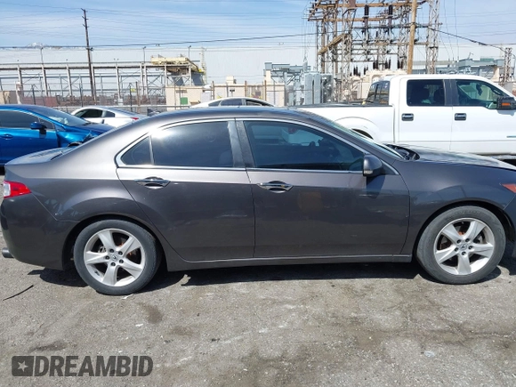 2010 Acura TSX with VIN JH4CU2F67AC038297, listed as a IAAI auction lot 41844587 with 136,741 mi miles and . Bid and sale history available at DreamBid. Image 13.
