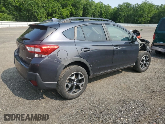 2018 Subaru Crosstrek Premium с VIN JF2GTABC5JH338534, выставлен на аукционе Copart как лот 59577195 с пробегом 54 307 миль миль и Списание • Salvage title. История ставок и продаж доступна на DreamBid. Изображение 3.