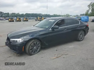 2018 BMW 5 Series 540i with VIN WBAJE5C54JWA93338, listed as a Copart auction lot 54312385 with 77,537 mi miles and Salvage title. Bid and sale history available at DreamBid. Image 1.