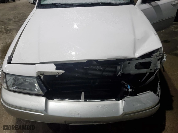 2004 Mercury Grand Marquis GS with VIN 2MEFM74W64X662709, listed as a Copart auction lot 46402055 with 100,715 mi miles and Salvage Title. Bid and sale history available at carsss.com. Image 11.