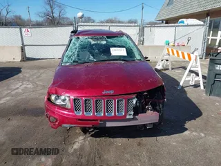 2014 Jeep Compass High Altitude with VIN 1C4NJCEA3ED539489, listed as a IAAI auction lot 41653313 with 124,462 mi miles. Bid and sale history available at carsss.com. Image 12.