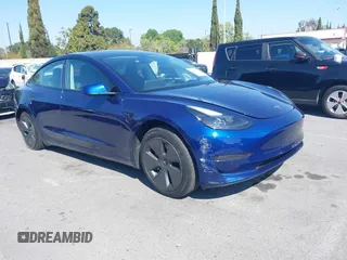 2023 Tesla Model 3 with VIN 5YJ3E1EA1PF431190, listed as a IAAI auction lot 41980007 with 26,164 mi miles and . Bid and sale history available at DreamBid. Image 1.