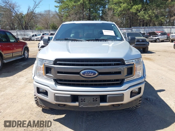 2018 Ford F-150 XL with VIN 1FTEW1EG1JKD53868, listed as a IAAI auction lot 41808028 with 117,568 mi miles and . Bid and sale history available at DreamBid. Image 12.