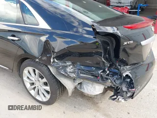 2016 Cadillac XTS Luxury Collection with VIN 2G61N5S31G9186760, listed as a IAAI auction lot 42390091 with 62,689 mi miles and . Bid and sale history available at DreamBid. Image 6.