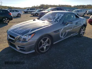 2013 Mercedes-Benz SLK-Class SLK 250 with VIN WDDPK4HA7DF058855, listed as a Copart auction lot 82673374 with 87,699 mi miles and Salvage Title. Bid and sale history available at carsss.com. Image 1.
