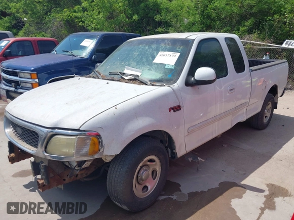 2003 Ford F-150 XL with VIN 1FTRX17243KA96403, listed as a IAAI auction lot 42017173 with 195,120 mi miles. Bid and sale history available at carsss.com. Image 2.