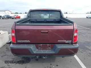 2009 Honda Ridgeline RTL with VIN 5FPYK16539B101836, listed as a IAAI auction lot 41894409 with 185,325 mi miles. Bid and sale history available at carsss.com. Image 17.