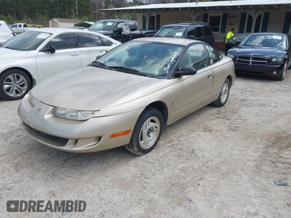 1997 Saturn SC z VIN 1G8ZE1285VZ125476, wystawiony jako IAAI lot #41832482 z przebiegiem 186 269 mil mil oraz . Historia ofert i sprzedaży dostępna na DreamBid. Obrazek 2.