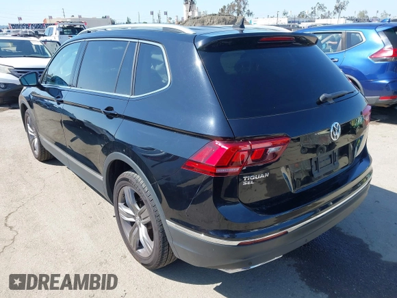 2021 Volkswagen Tiguan SE with VIN 3VV3B7AX1MM045478, listed as a IAAI auction lot 41947899 with 56,694 mi miles and . Bid and sale history available at DreamBid. Image 3.