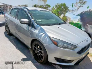 2016 Ford Focus SE z VIN 1FADP3F29GL314719, wystawiony jako Copart lot #58445605 z przebiegiem 76 536 mil mil oraz Czysty tytuł • Clean title. Historia ofert i sprzedaży dostępna na DreamBid. Obrazek 1.