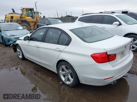 2014 BMW 3 Series 328i xDrive with VIN WBA3B5G50ENS06304, listed as a IAAI auction lot 41402704 with 139,943 mi miles. Bid and sale history available at carsss.com. Image 3.