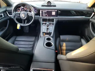2021 Porsche Panamera with VIN WP0AJ2A73ML117455, listed as a Copart auction lot 76828823 with 54,543 mi miles. Bid and sale history available at carsss.com. Image 8.