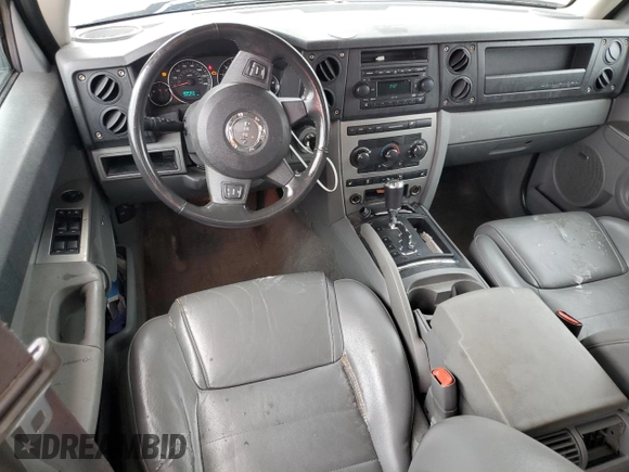 2007 Jeep Commander Sport z VIN 1J8HG48K97C598103, wystawiony jako Copart lot #65140225 z przebiegiem 204 638 mil mil oraz Czysty tytuł • Clean title. Historia ofert i sprzedaży dostępna na DreamBid. Obrazek 8.