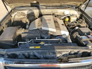 2000 Toyota Land Cruiser z VIN JT3HT05J9Y0123937, wystawiony jako Copart lot #56599145 z przebiegiem 132 262 mil mil oraz Szkoda całkowita • Salvage title. Historia ofert i sprzedaży dostępna na DreamBid. Obrazek 11.