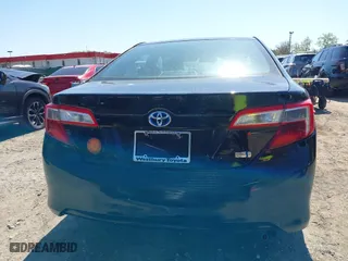 2014 Toyota Camry Hybrid LE with VIN 4T1BD1FK5EU131433, listed as a IAAI auction lot 42069399 with 51,046 mi miles. Bid and sale history available at carsss.com. Image 16.