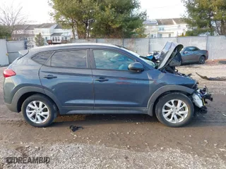 2019 Hyundai Tucson Value with VIN KM8J3CA48KU051820, listed as a IAAI auction lot 41228352 with 40,031 mi miles. Bid and sale history available at carsss.com. Image 13.