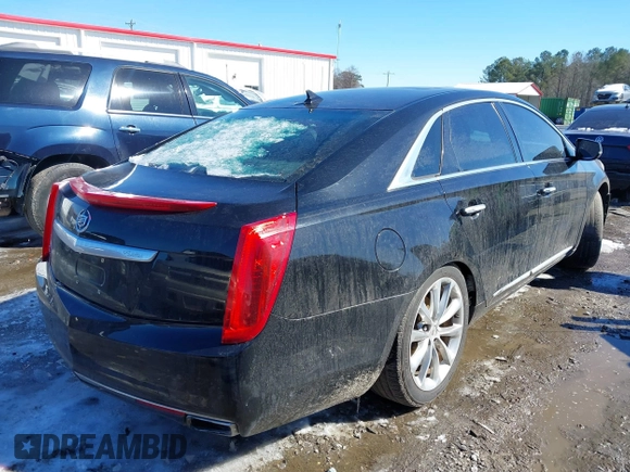 2013 Cadillac XTS Luxury with VIN 2G61P5S33D9101486, listed as a IAAI auction lot 41629349 with 141,050 mi miles. Bid and sale history available at carsss.com. Image 4.