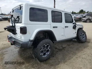2023 Jeep Wrangler Rubicon with VIN 1C4HJXFG3PW691724, listed as a Copart auction lot 50985745 with 32,377 mi miles and Salvage title. Bid and sale history available at DreamBid. Image 3.