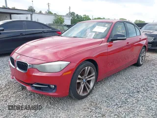 2012 BMW 3 Series 328i with VIN WBA3A5C55CF348003, listed as a IAAI auction lot 42034401 with 207,550 mi miles. Bid and sale history available at carsss.com. Image 2.