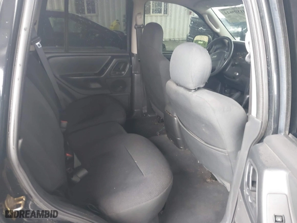 2004 Jeep Grand Cherokee Laredo with VIN 1J4GX48N94C435700, listed as a IAAI auction lot 41809624 with 147,413 mi miles. Bid and sale history available at carsss.com. Image 8.