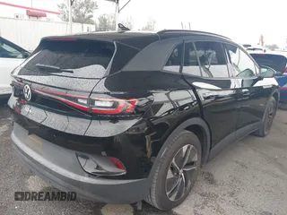 2021 Volkswagen ID.4 Pro S z VIN WVGTMPE26MP065481, wystawiony jako IAAI lot #41719800 z przebiegiem Nie podano mil oraz . Historia ofert i sprzedaży dostępna na DreamBid. Obrazek 4.