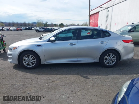 2017 Kia Optima LX with VIN 5XXGT4L39HG148760, listed as a IAAI auction lot 41889329 with 140,834 mi miles and . Bid and sale history available at DreamBid. Image 14.