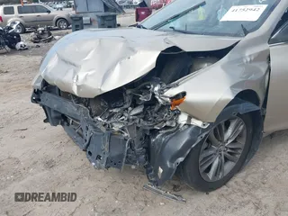 2015 Toyota Camry XLE with VIN 4T1BF1FK8FU017566, listed as a IAAI auction lot 41752942 with 196,495 mi miles and . Bid and sale history available at DreamBid. Image 6.