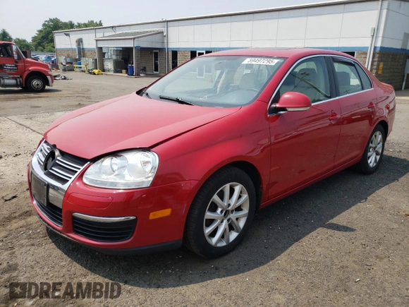 2010 Volkswagen Jetta SE with VIN 3VWRZ7AJ4AM059304, listed as a Copart auction lot 59497295 with 114,957 mi miles and Salvage title. Bid and sale history available at DreamBid. Image 1.