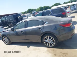 2014 Mazda 6 i Touring with VIN JM1GJ1V55E1105379, listed as a IAAI auction lot 42010585 with 153,870 mi miles and . Bid and sale history available at DreamBid. Image 15.