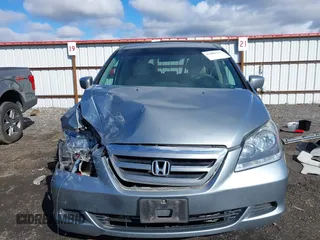 2007 Honda Odyssey EX with VIN 5FNRL384X7B119757, listed as a IAAI auction lot 41809763 with 163,526 mi miles and . Bid and sale history available at DreamBid. Image 12.