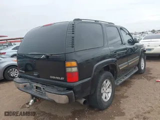 2005 Chevrolet Tahoe LT with VIN 1GNEC13T25R195635, listed as a IAAI auction lot 41581082 with 353,913 mi miles. Bid and sale history available at carsss.com. Image 4.
