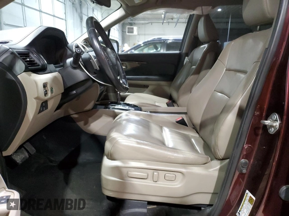 2017 Honda Pilot Touring with VIN 5FNYF6H99HB024088, listed as a Copart auction lot 88650165 with 123,964 mi miles and Salvage Title. Bid and sale history available at DreamBid. Image 7.