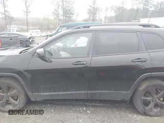 2017 Jeep Cherokee Sport with VIN 1C4PJLAB4HD240878, listed as a IAAI auction lot 41879830 with 162,627 mi miles. Bid and sale history available at carsss.com. Image 14.